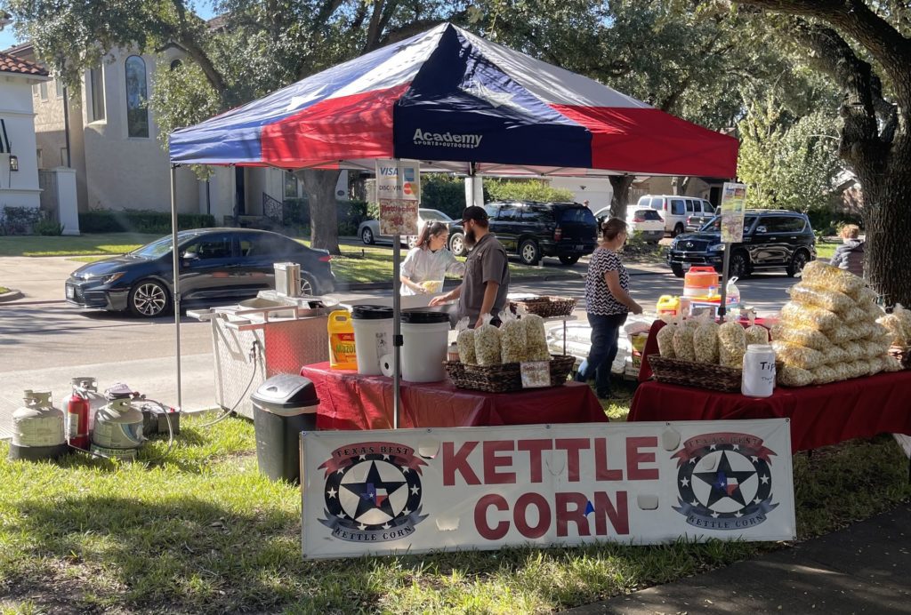 Kettle corn stand with workers